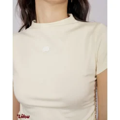 Liilou Embroidery Logo Turtleneck Drawstring Top Cream