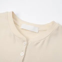 Three Quarters Hotfix Logo Henry Collar Slim Top Beige