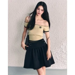 AGAM Off-Shoulder Metal Logo Knit Top
